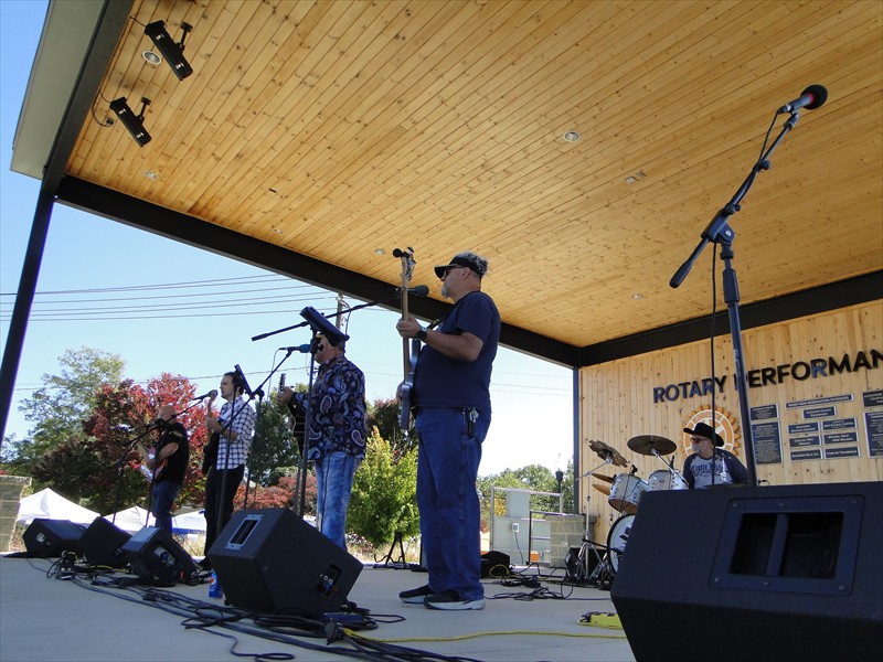 Nunya Bizness performs on the Rotary Performance Stage.