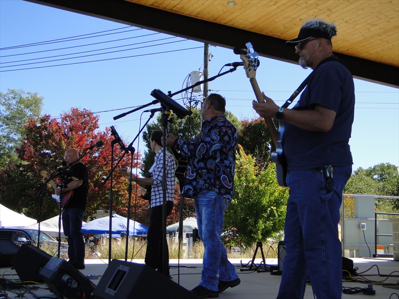 Nunya Bizness performs on the Rotary Performance Stage.